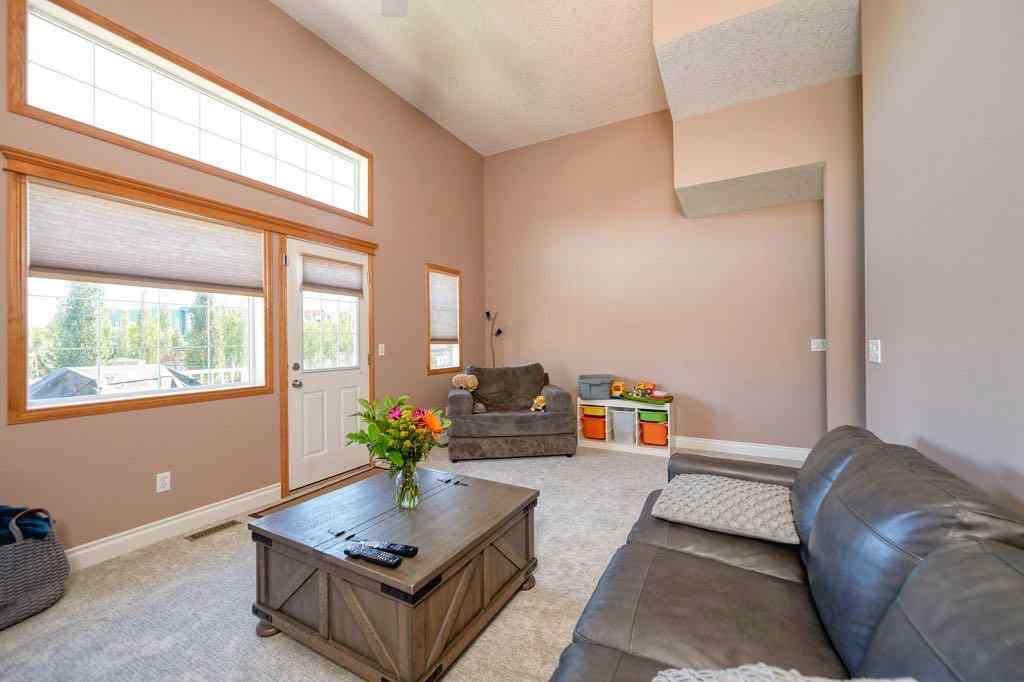 MLS® A2257338 - 24 Cougar Ridge Mews SW in Cougar Ridge Calgary, Residential