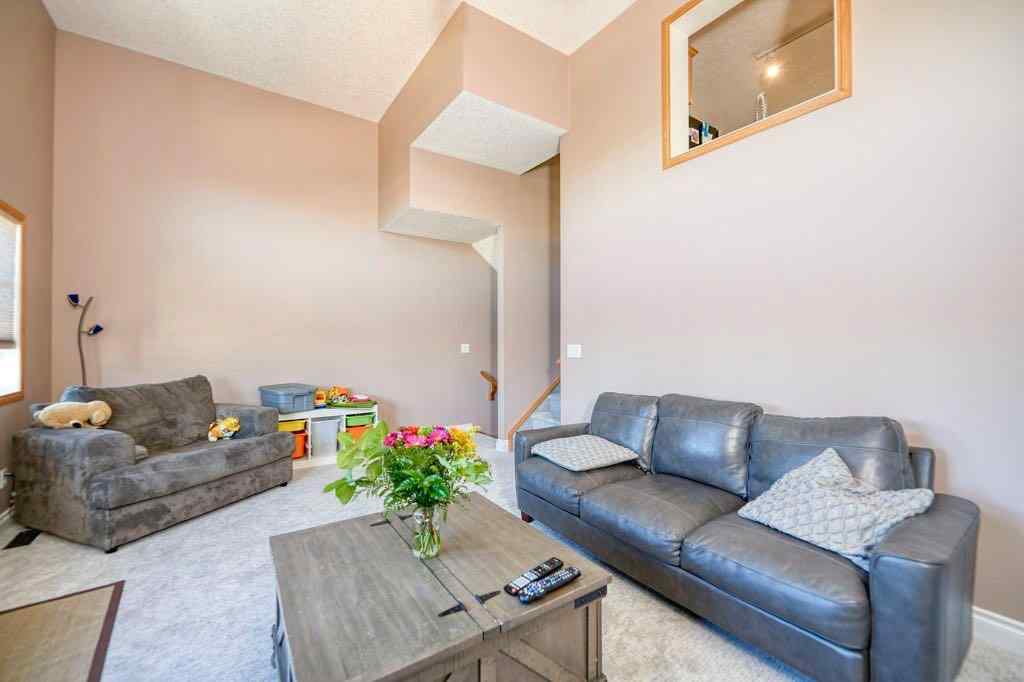 MLS® A2257338 - 24 Cougar Ridge Mews SW in Cougar Ridge Calgary, Residential