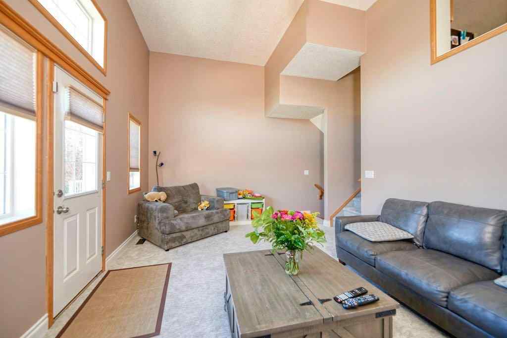 MLS® A2257338 - 24 Cougar Ridge Mews SW in Cougar Ridge Calgary, Residential