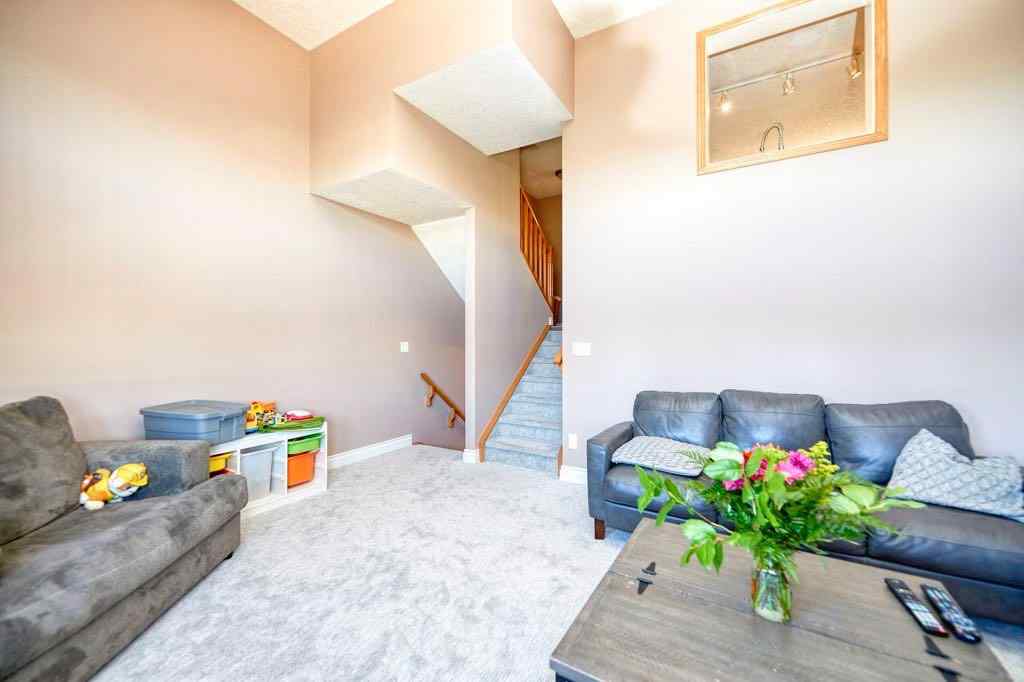 MLS® A2257338 - 24 Cougar Ridge Mews SW in Cougar Ridge Calgary, Residential