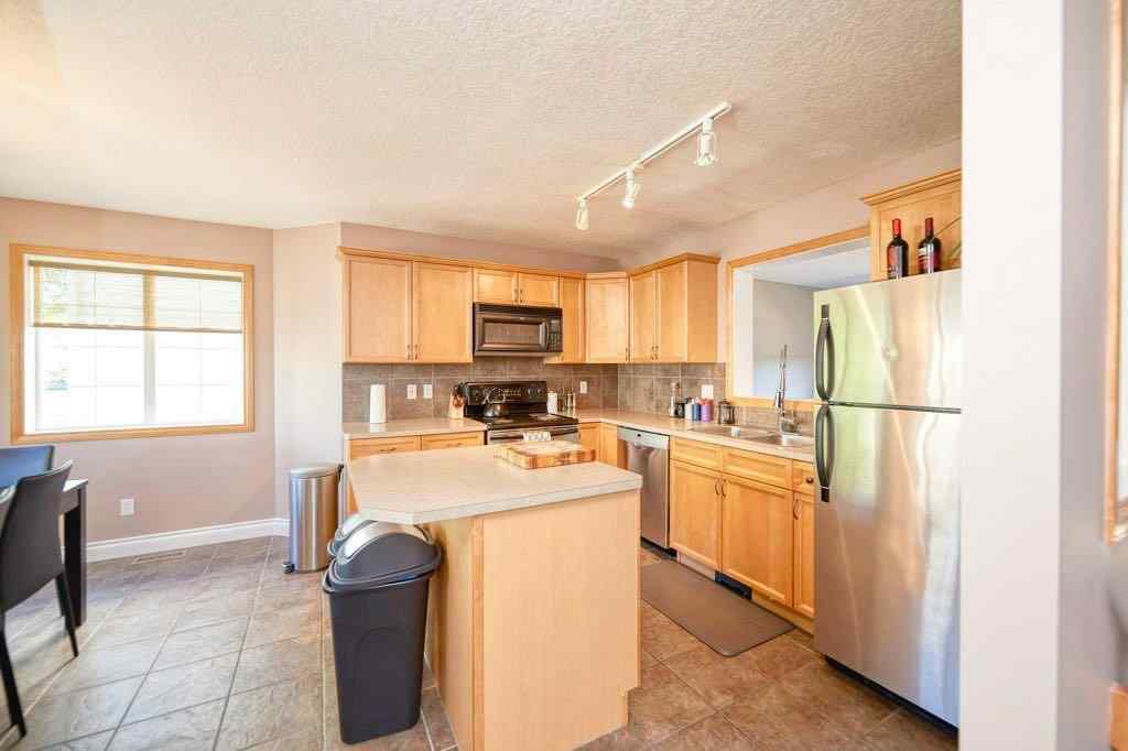 MLS® A2257338 - 24 Cougar Ridge Mews SW in Cougar Ridge Calgary, Residential