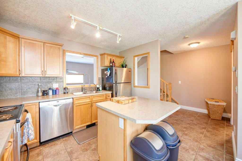 MLS® A2257338 - 24 Cougar Ridge Mews SW in Cougar Ridge Calgary, Residential