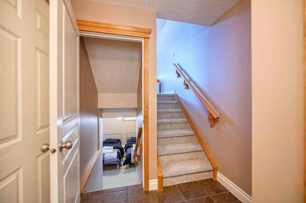 MLS® A2257338 - 24 Cougar Ridge Mews SW in Cougar Ridge Calgary, Residential