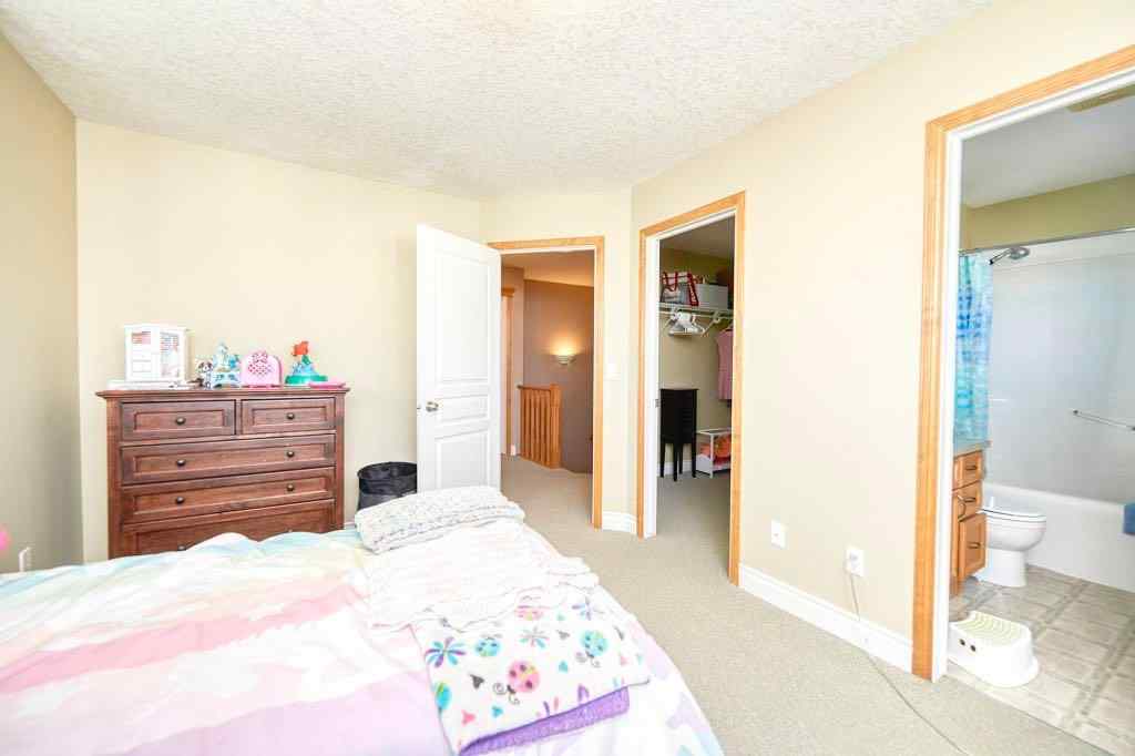 MLS® A2257338 - 24 Cougar Ridge Mews SW in Cougar Ridge Calgary, Residential