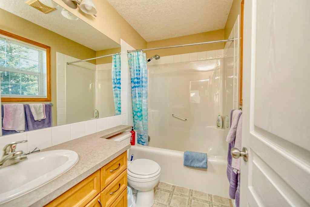 MLS® A2257338 - 24 Cougar Ridge Mews SW in Cougar Ridge Calgary, Residential