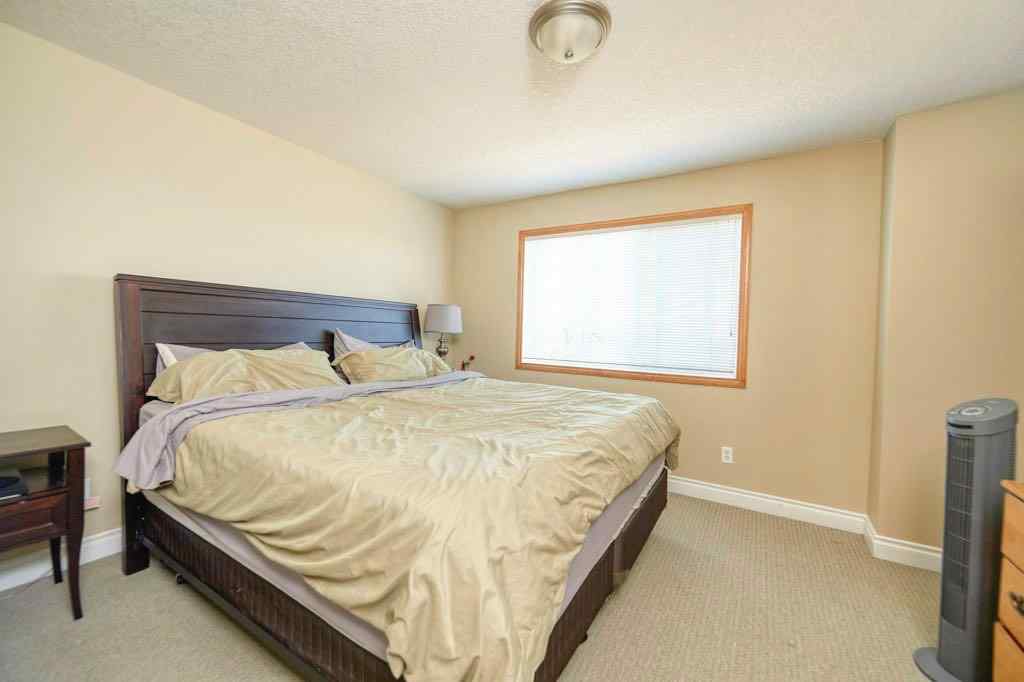 MLS® A2257338 - 24 Cougar Ridge Mews SW in Cougar Ridge Calgary, Residential