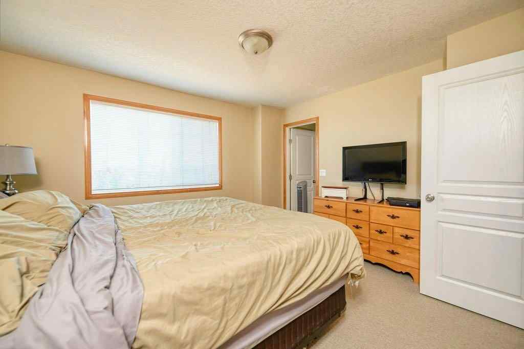 MLS® A2257338 - 24 Cougar Ridge Mews SW in Cougar Ridge Calgary, Residential