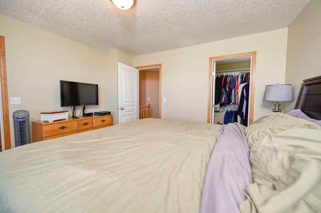 MLS® A2257338 - 24 Cougar Ridge Mews SW in Cougar Ridge Calgary, Residential