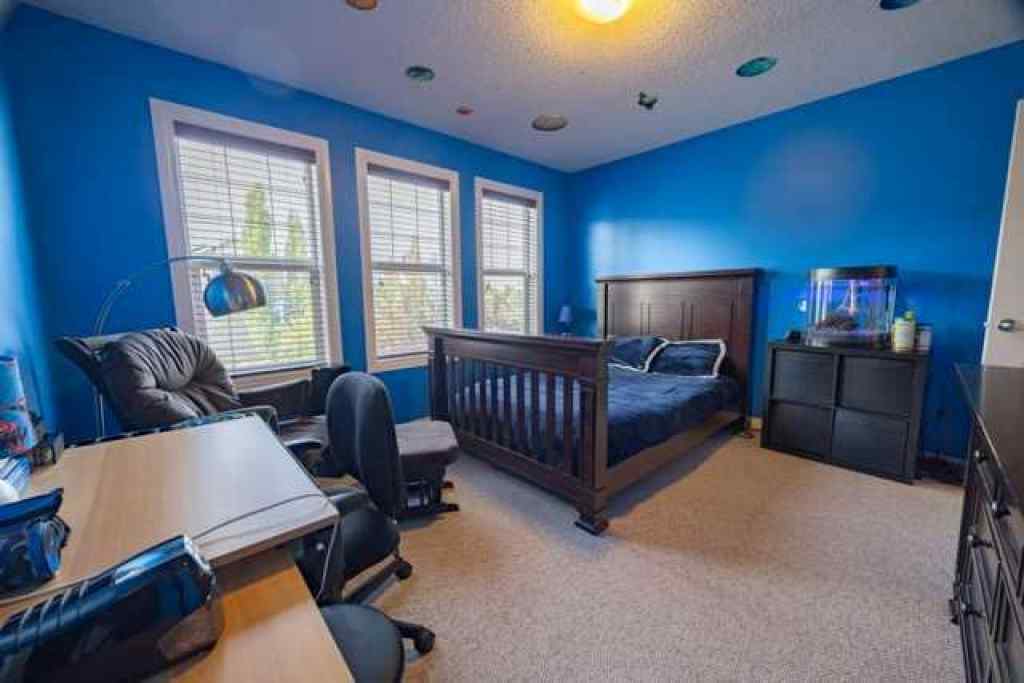 MLS® A2257342 - 28 Crestmont Way SW in Crestmont Calgary, Residential