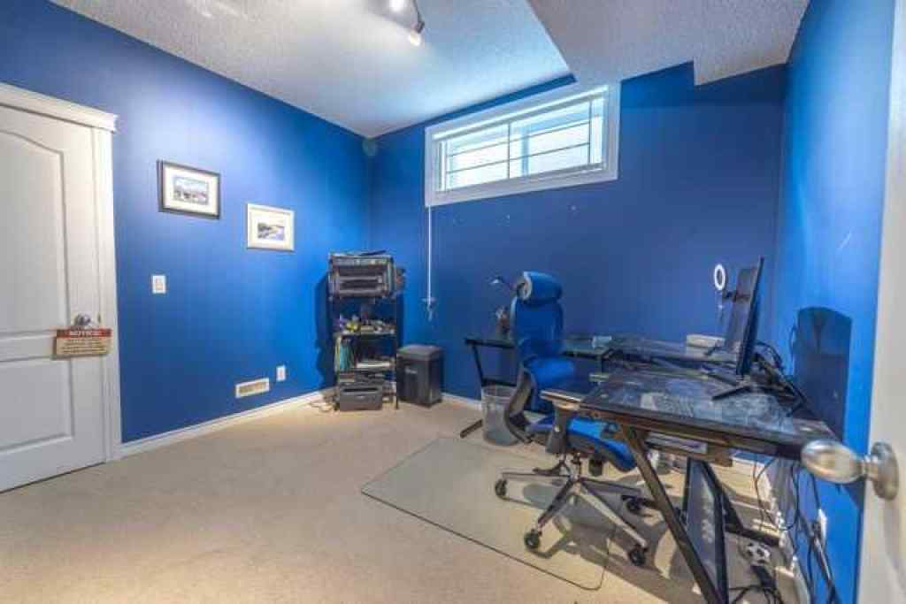 MLS® A2257342 - 28 Crestmont Way SW in Crestmont Calgary, Residential