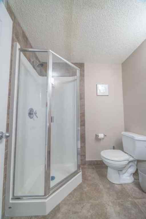 MLS® A2257342 - 28 Crestmont Way SW in Crestmont Calgary, Residential