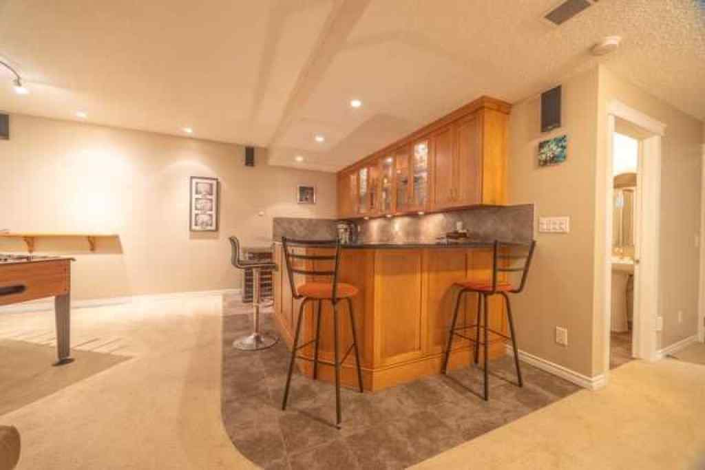 MLS® A2257342 - 28 Crestmont Way SW in Crestmont Calgary, Residential
