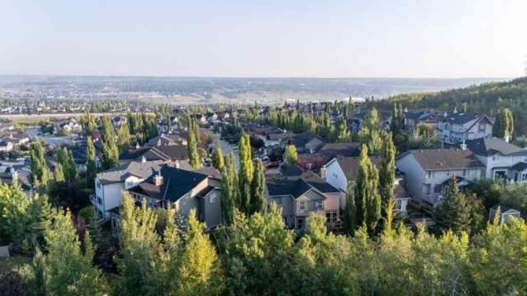 MLS® A2257342 - 28 Crestmont Way SW in Crestmont Calgary, Residential