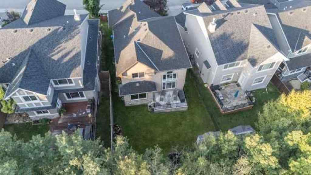 MLS® A2257342 - 28 Crestmont Way SW in Crestmont Calgary, Residential