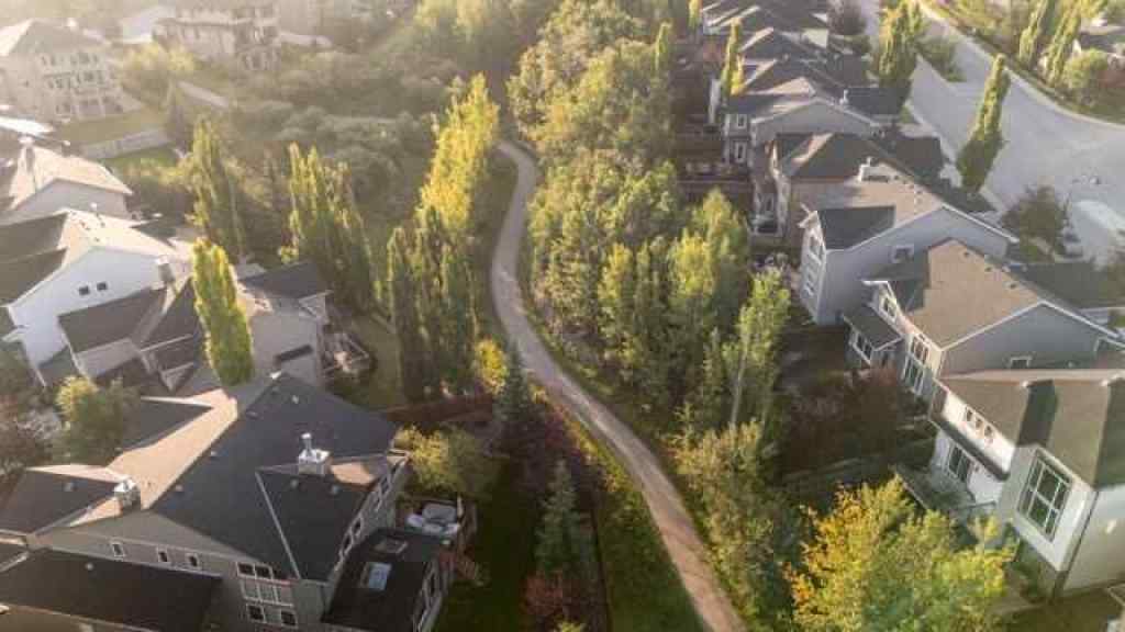 MLS® A2257342 - 28 Crestmont Way SW in Crestmont Calgary, Residential