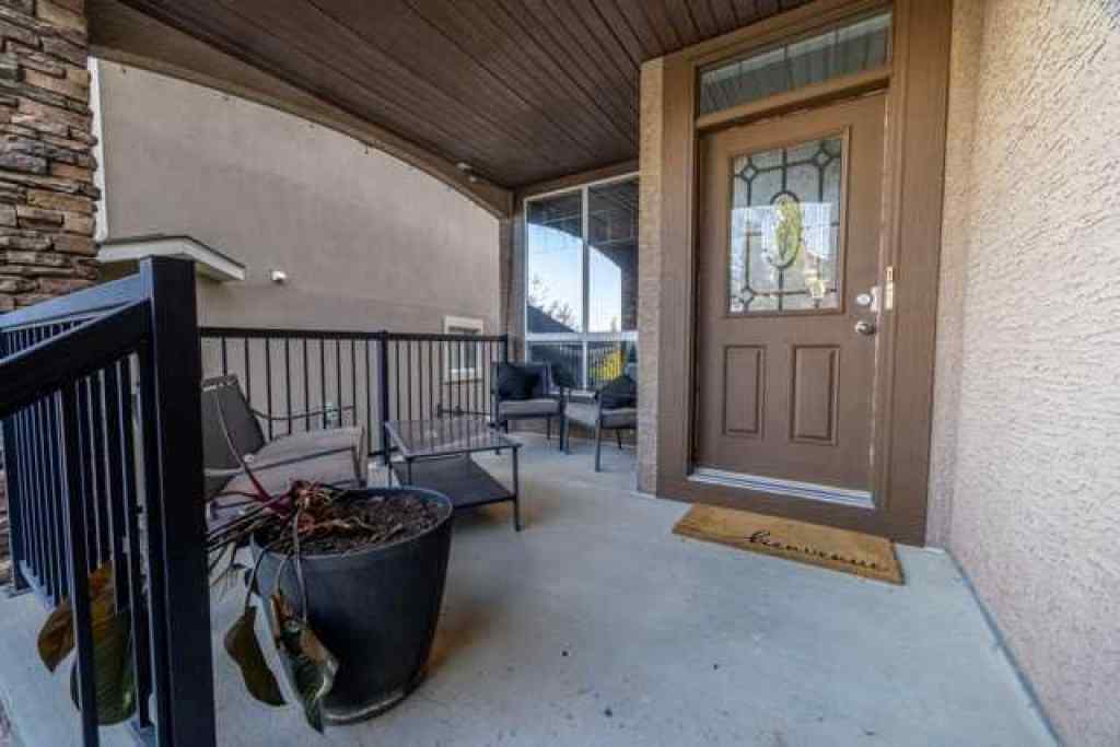 MLS® A2257342 - 28 Crestmont Way SW in Crestmont Calgary, Residential