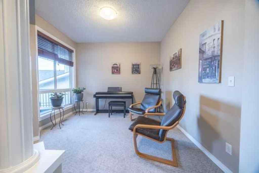 MLS® A2257342 - 28 Crestmont Way SW in Crestmont Calgary, Residential