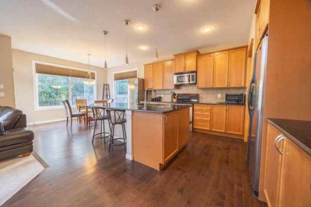MLS® A2257342 - 28 Crestmont Way SW in Crestmont Calgary, Residential
