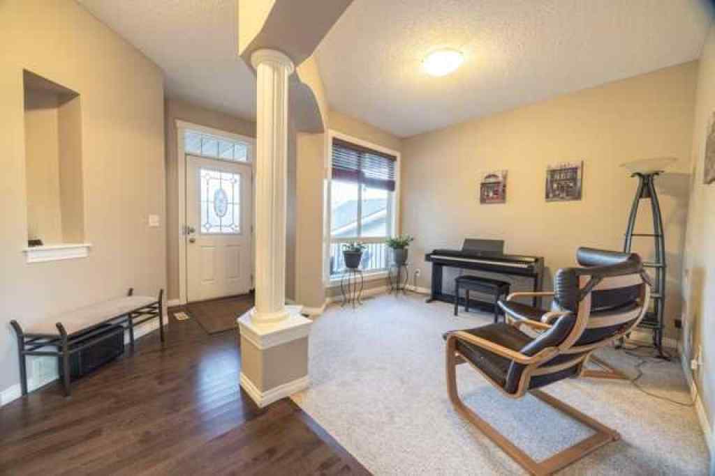 MLS® A2257342 - 28 Crestmont Way SW in Crestmont Calgary, Residential