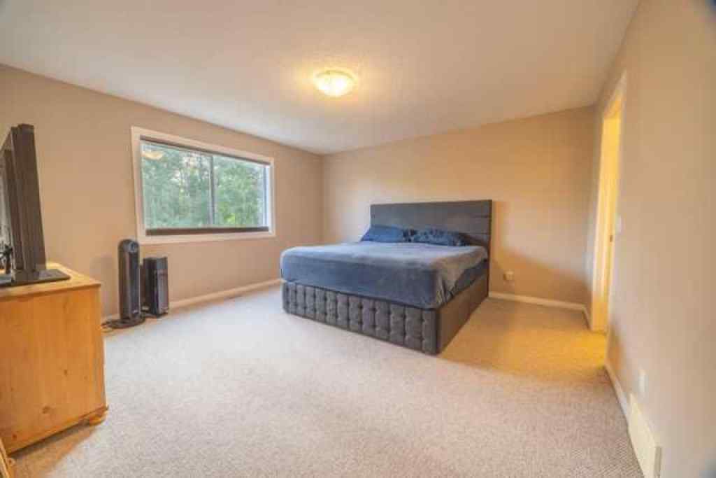 MLS® A2257342 - 28 Crestmont Way SW in Crestmont Calgary, Residential