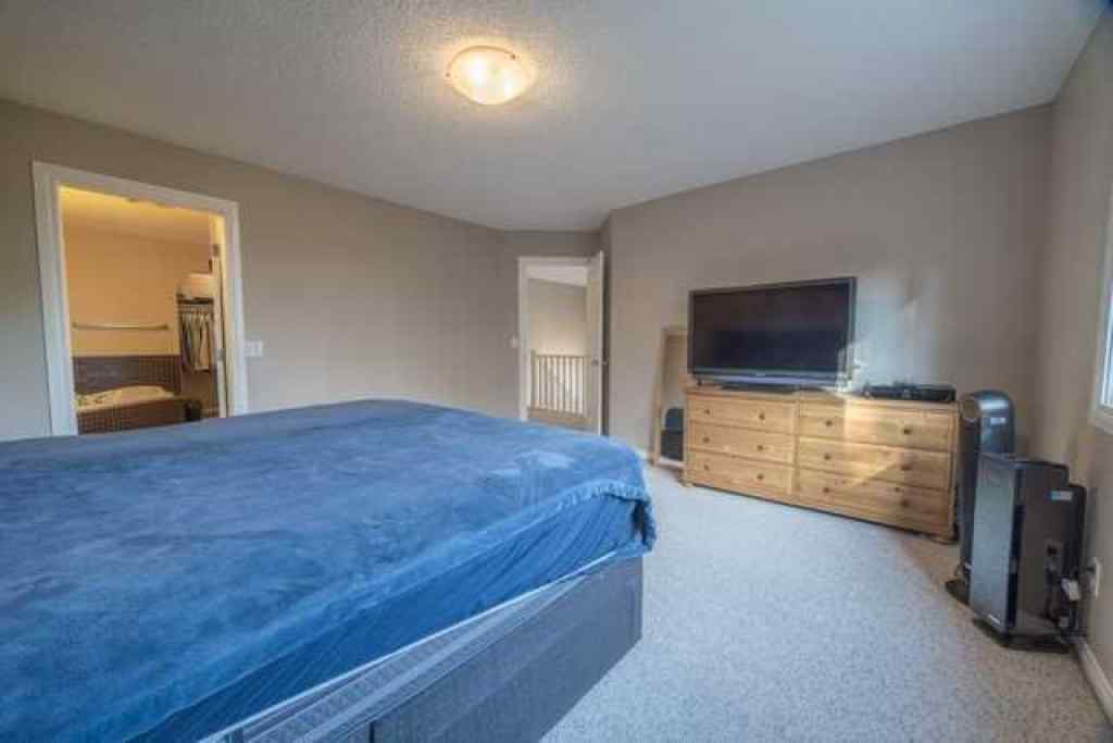 MLS® A2257342 - 28 Crestmont Way SW in Crestmont Calgary, Residential