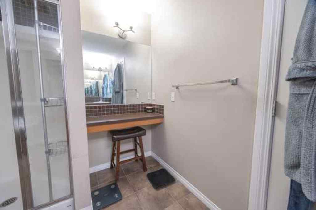 MLS® A2257342 - 28 Crestmont Way SW in Crestmont Calgary, Residential