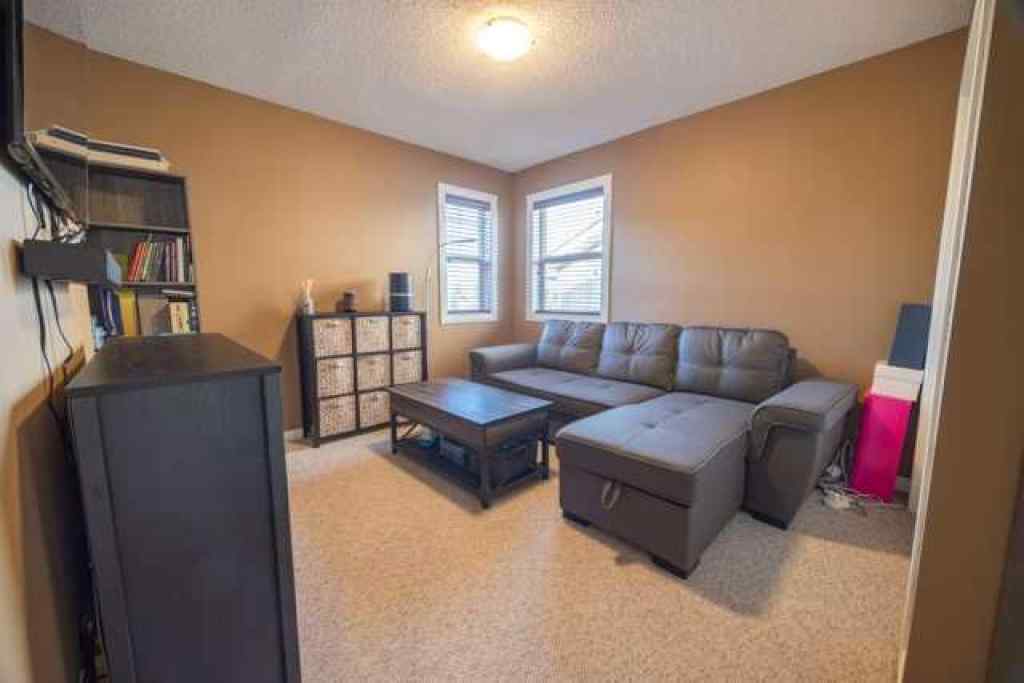 MLS® A2257342 - 28 Crestmont Way SW in Crestmont Calgary, Residential