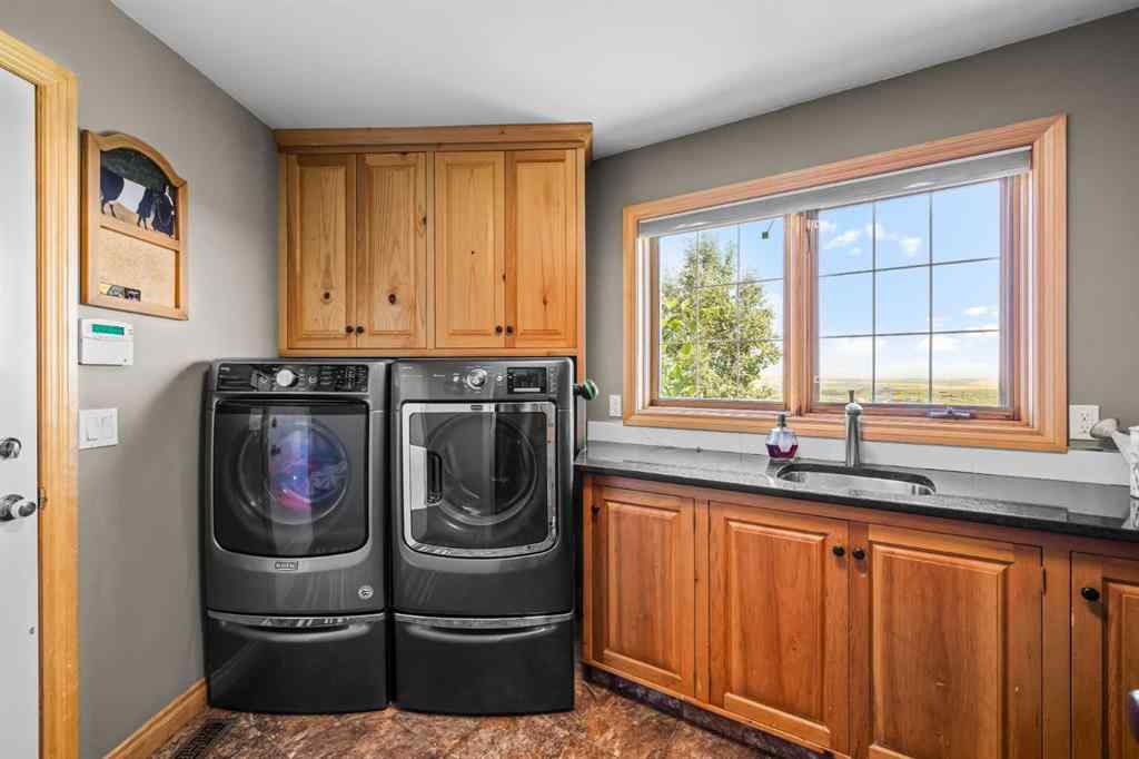 MLS® A2257346 - 98 equestrian Drive  in Bearspaw_Calg Rural Rocky View County, Residential