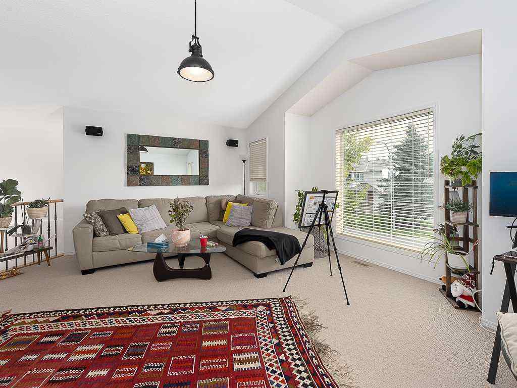MLS® A2257360 - 208 Mt Brewster Circle SE in McKenzie Lake Calgary, Residential