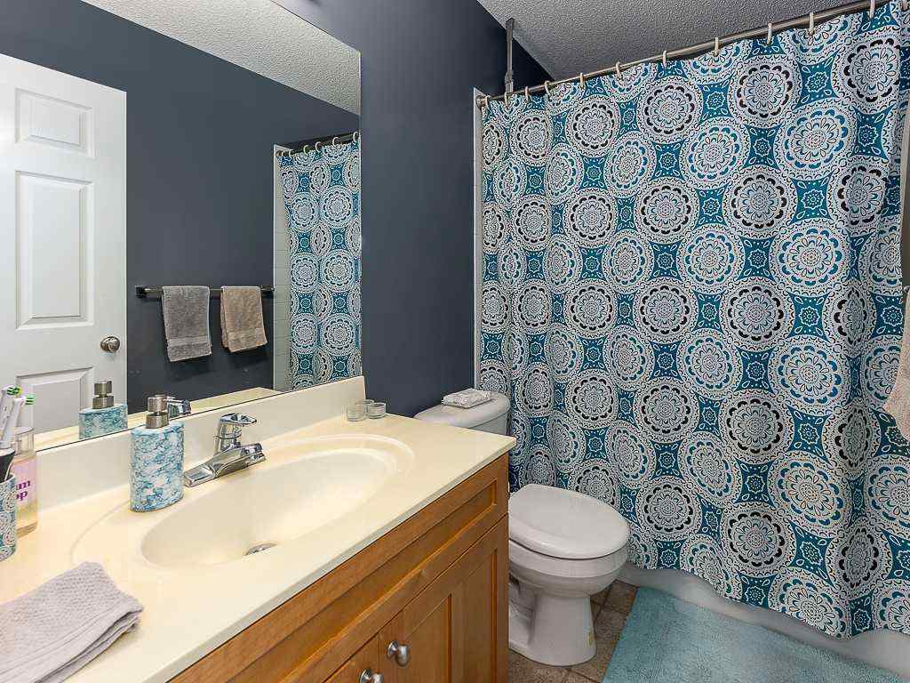 MLS® A2257360 - 208 Mt Brewster Circle SE in McKenzie Lake Calgary, Residential
