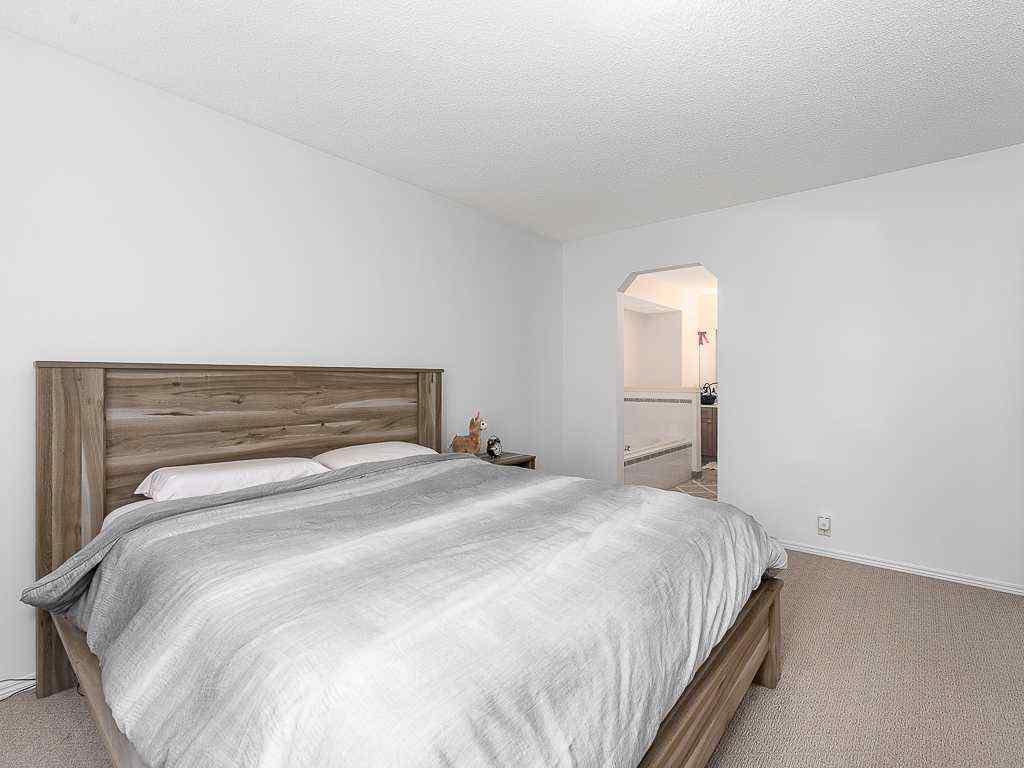 MLS® A2257360 - 208 Mt Brewster Circle SE in McKenzie Lake Calgary, Residential