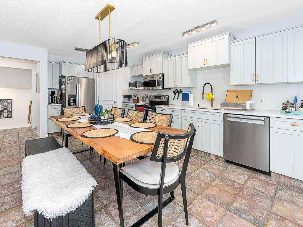 MLS® A2257360 - 208 Mt Brewster Circle SE in McKenzie Lake Calgary, Residential