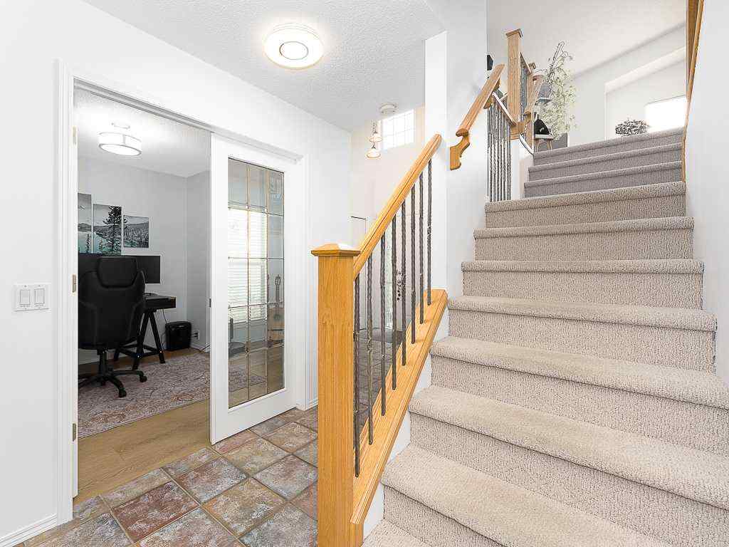 MLS® A2257360 - 208 Mt Brewster Circle SE in McKenzie Lake Calgary, Residential