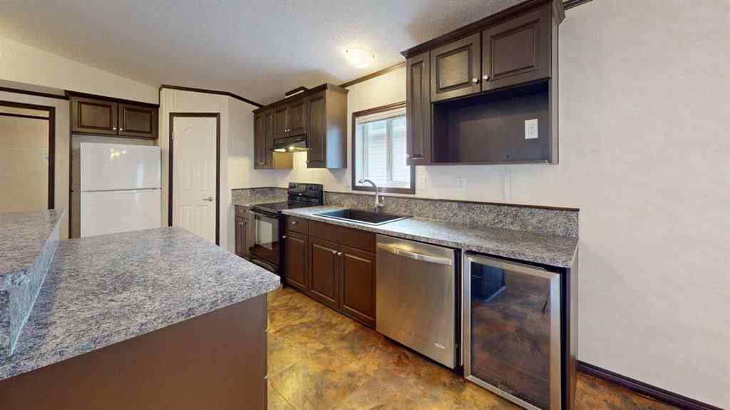 MLS® A2257379 - 392 Gregoire Crescent  in Gregoire Park Fort McMurray, Residential