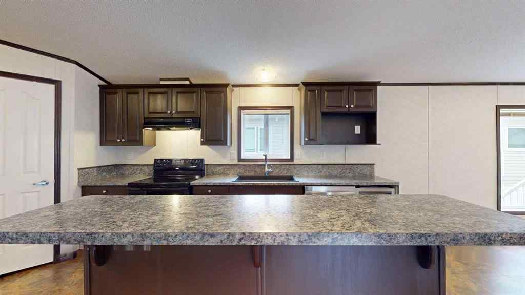 MLS® A2257379 - 392 Gregoire Crescent  in Gregoire Park Fort McMurray, Residential