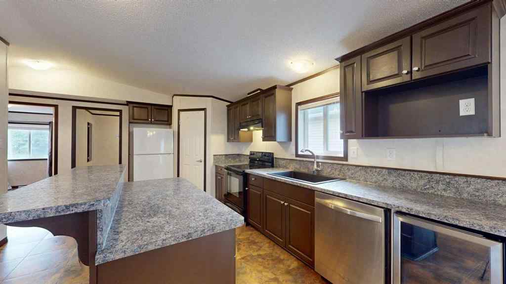 MLS® A2257379 - 392 Gregoire Crescent  in Gregoire Park Fort McMurray, Residential