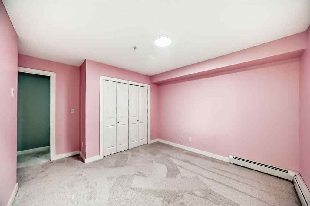 MLS® A2257393 - Unit #107 7110 80 Avenue NE in Saddle Ridge Calgary, Residential