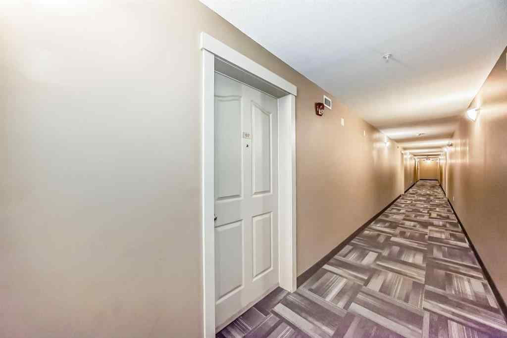 MLS® A2257393 - Unit #107 7110 80 Avenue NE in Saddle Ridge Calgary, Residential