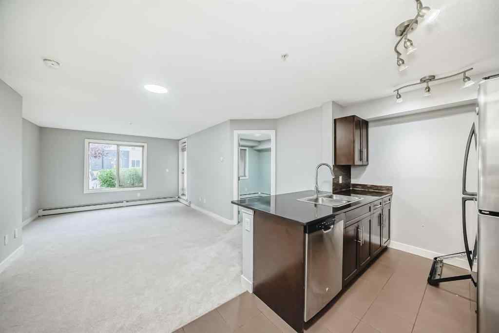 MLS® A2257393 - Unit #107 7110 80 Avenue NE in Saddle Ridge Calgary, Residential