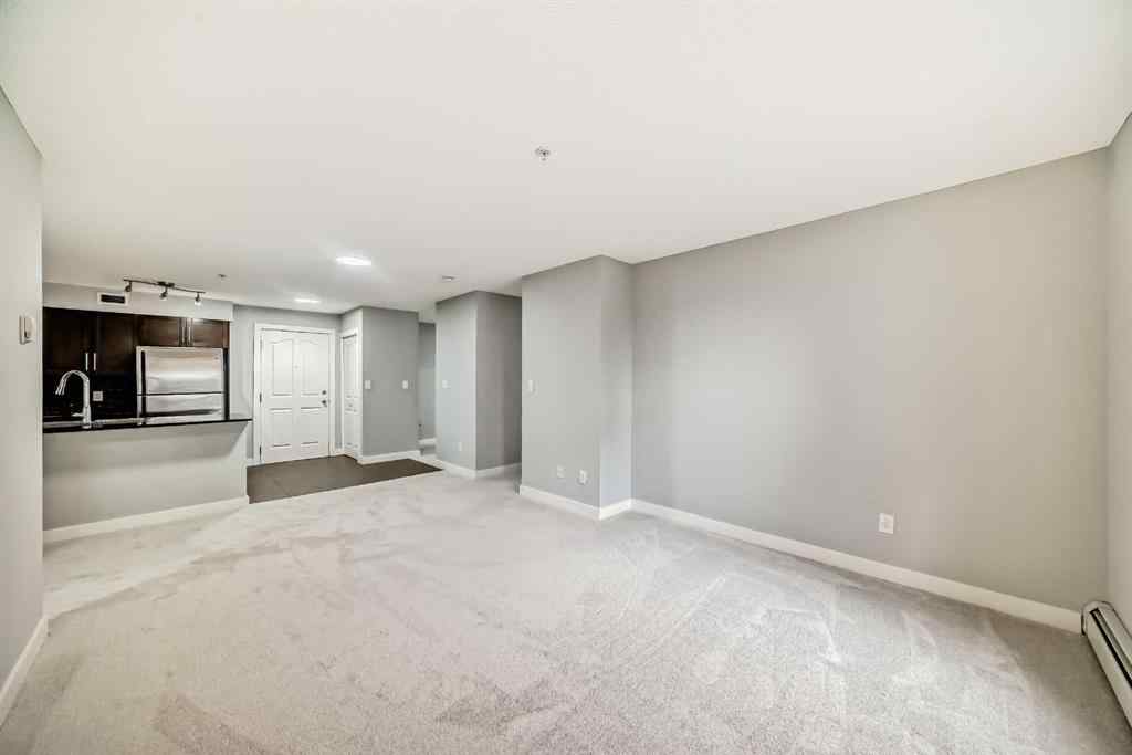 MLS® A2257393 - Unit #107 7110 80 Avenue NE in Saddle Ridge Calgary, Residential