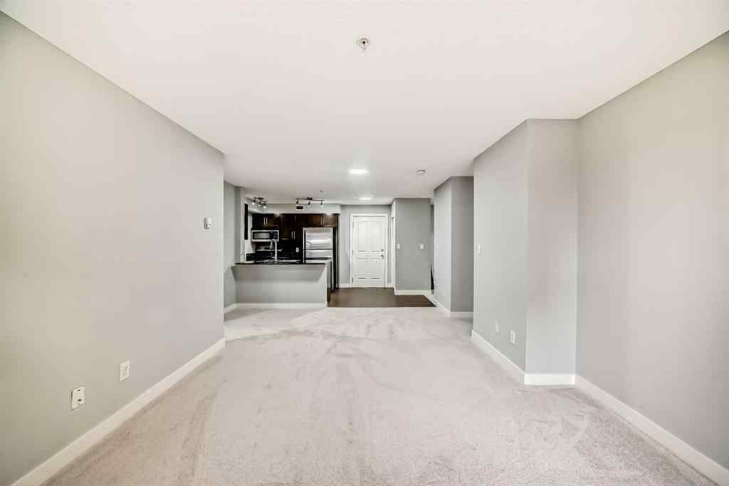 MLS® A2257393 - Unit #107 7110 80 Avenue NE in Saddle Ridge Calgary, Residential