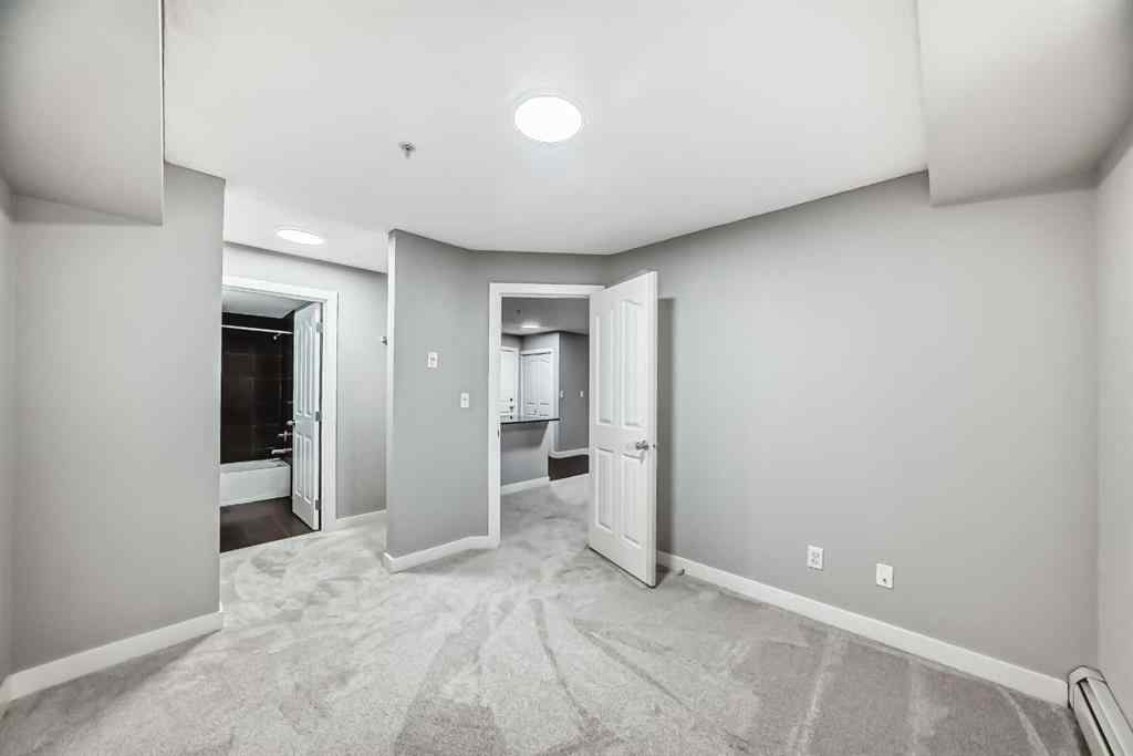 MLS® A2257393 - Unit #107 7110 80 Avenue NE in Saddle Ridge Calgary, Residential