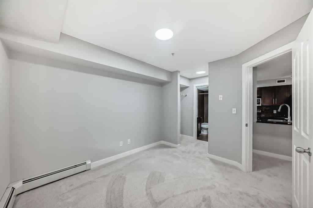 MLS® A2257393 - Unit #107 7110 80 Avenue NE in Saddle Ridge Calgary, Residential