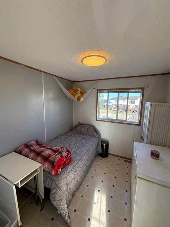 MLS® A2257401 - 9702 108A Avenue  in NONE Clairmont, Residential