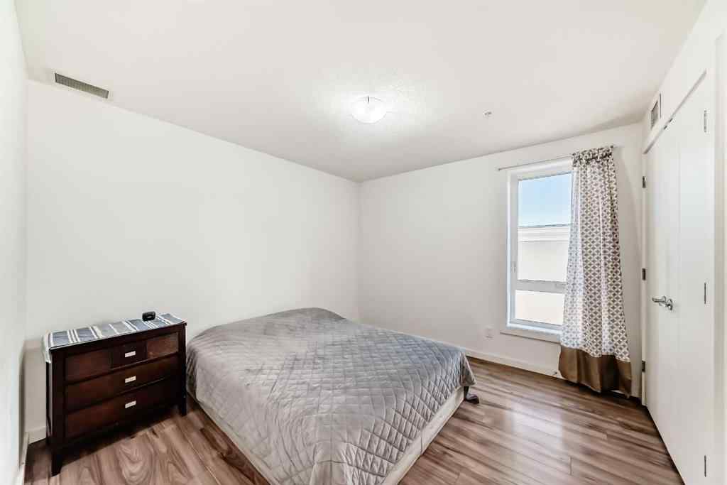 MLS® A2257403 - Unit #102 1629 38 Street SW in Rosscarrock Calgary, Residential