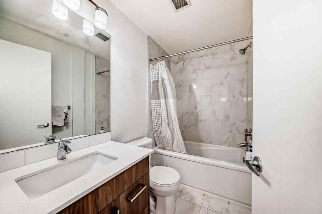 MLS® A2257403 - Unit #102 1629 38 Street SW in Rosscarrock Calgary, Residential