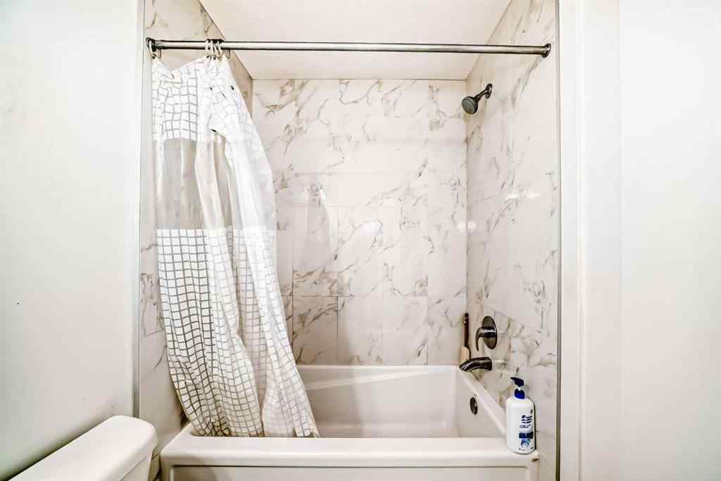 MLS® A2257403 - Unit #102 1629 38 Street SW in Rosscarrock Calgary, Residential