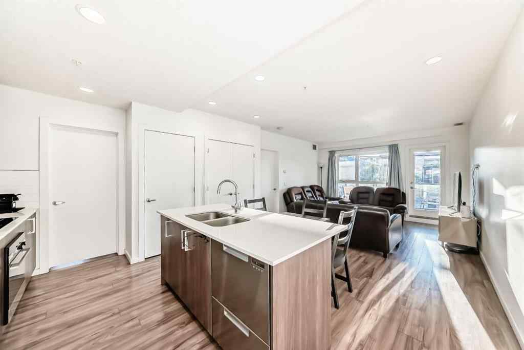 MLS® A2257403 - Unit #102 1629 38 Street SW in Rosscarrock Calgary, Residential