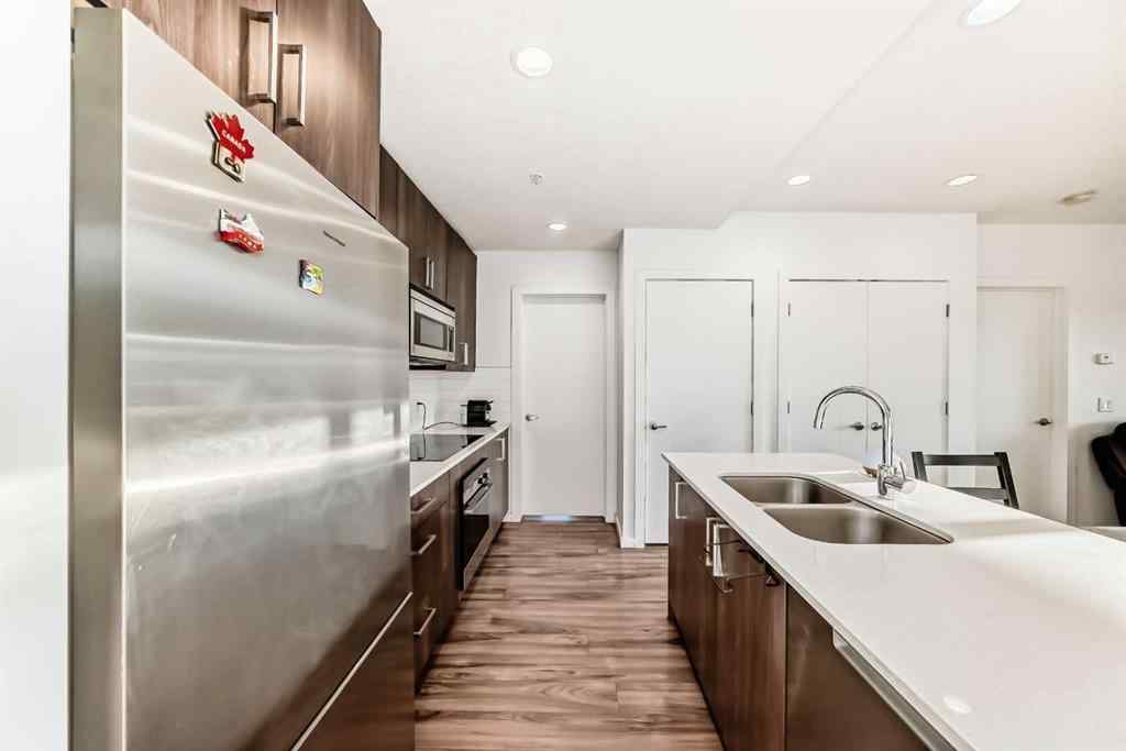 MLS® A2257403 - Unit #102 1629 38 Street SW in Rosscarrock Calgary, Residential