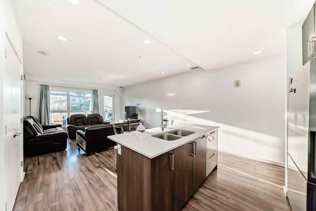 MLS® A2257403 - Unit #102 1629 38 Street SW in Rosscarrock Calgary, Residential